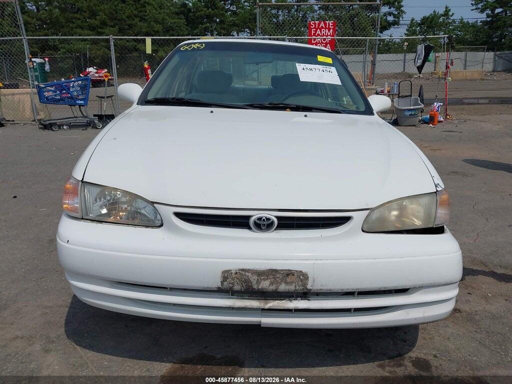 1NXBR12E7YZ392441 2000 TOYOTA COROLLA photo no. 12