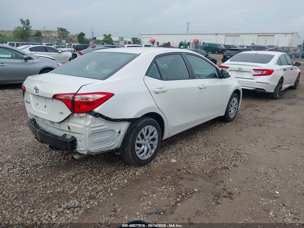 5YFBURHE4JP805475 2018 TOYOTA COROLLA photo no. 4
