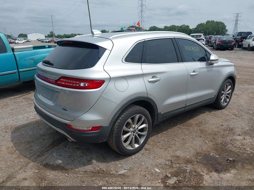 5LMCJ2C90GUJ28038 2016 LINCOLN MKC photo no. 4