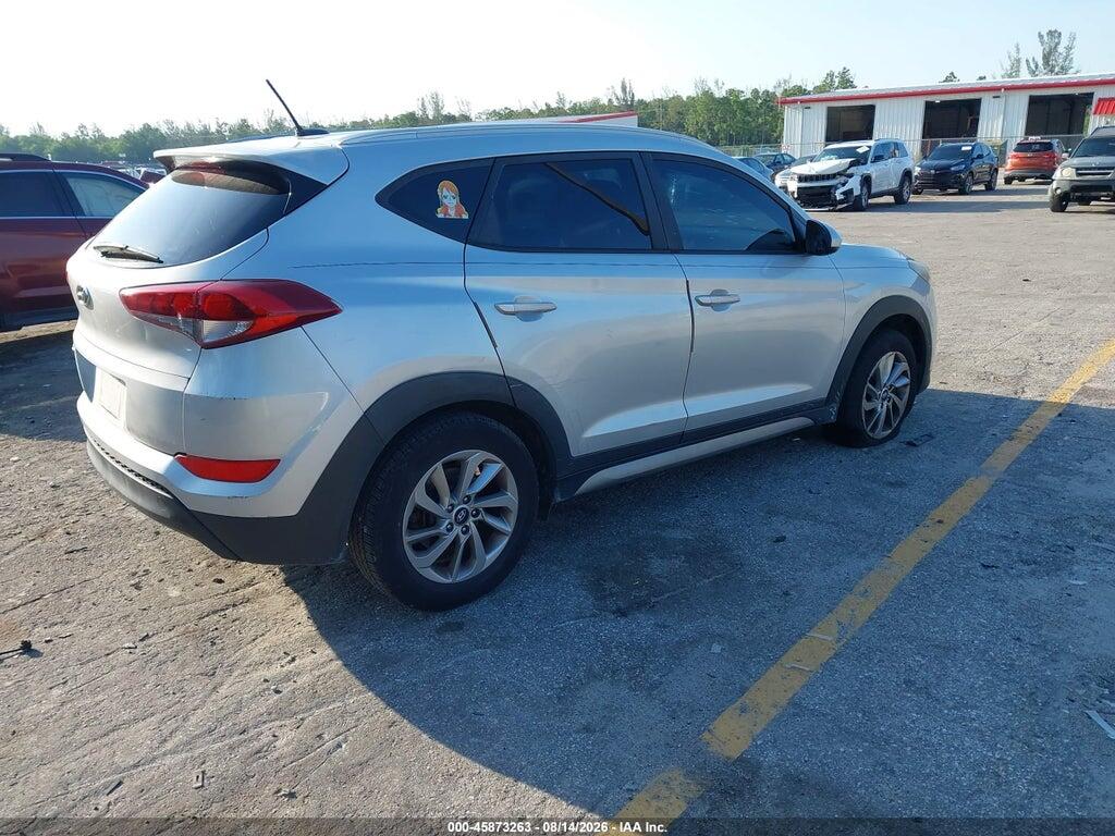 KM8J33A49HU296487 2017 HYUNDAI TUCSON photo no. 4