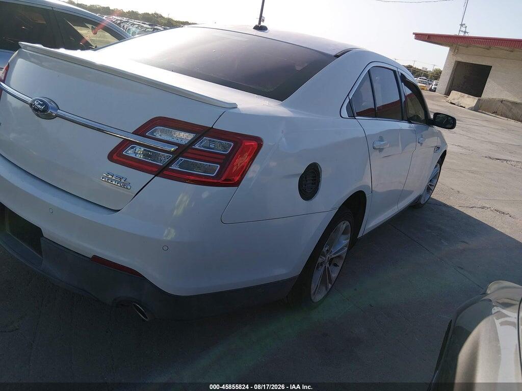 1FAHP2E85EG137531 2014 FORD TAURUS photo no. 4
