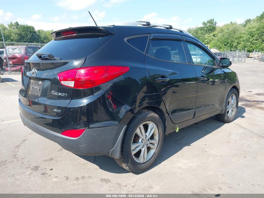 KM8JUCAC6CU396933 2012 HYUNDAI TUCSON photo no. 4
