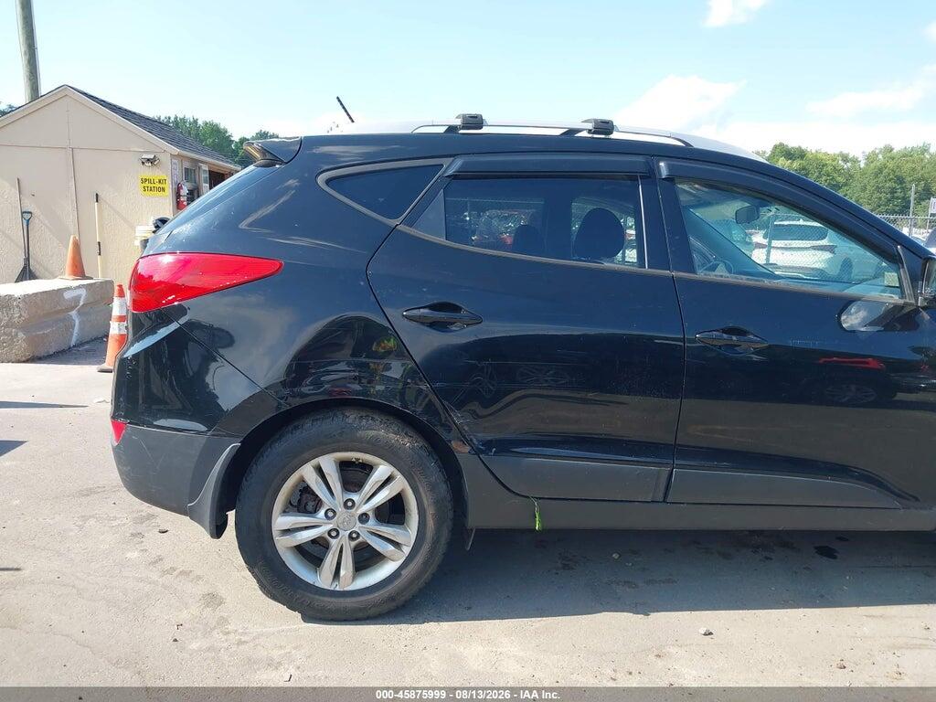 KM8JUCAC6CU396933 2012 HYUNDAI TUCSON photo no. 6