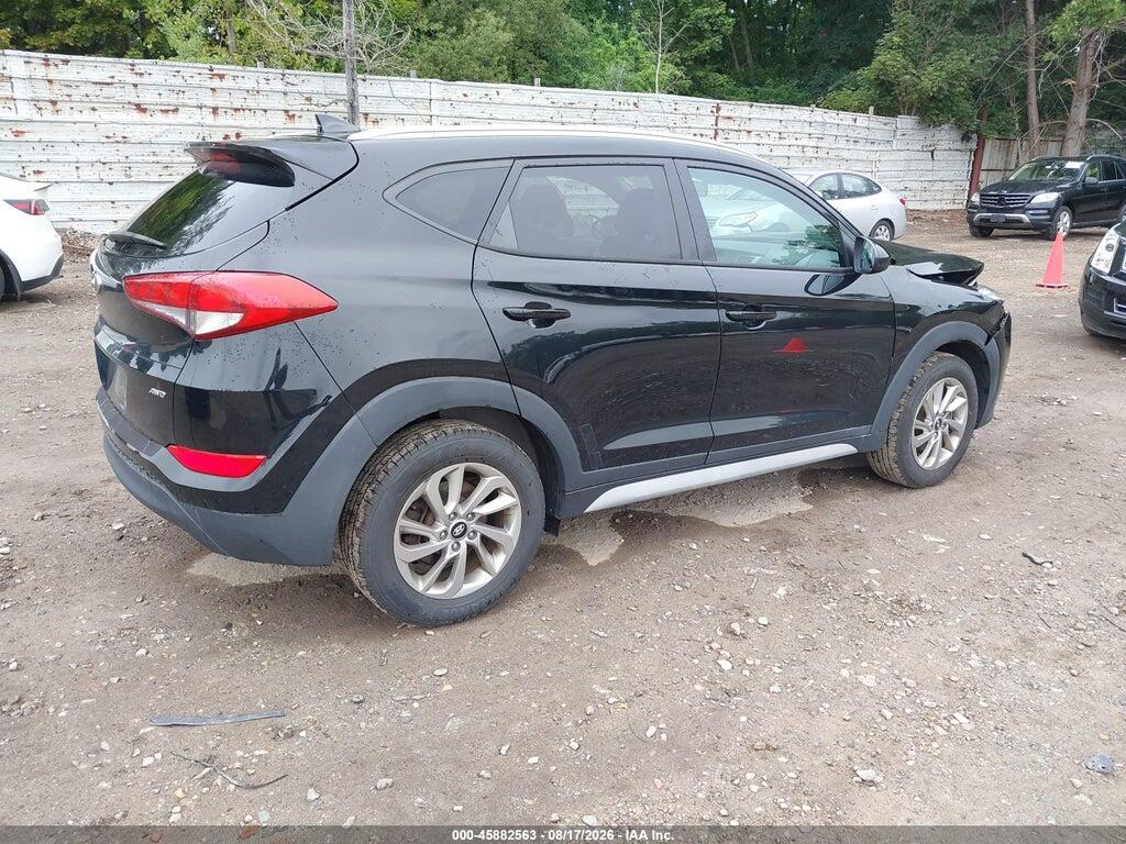 KM8J3CA41JU774097 2018 HYUNDAI TUCSON photo no. 4