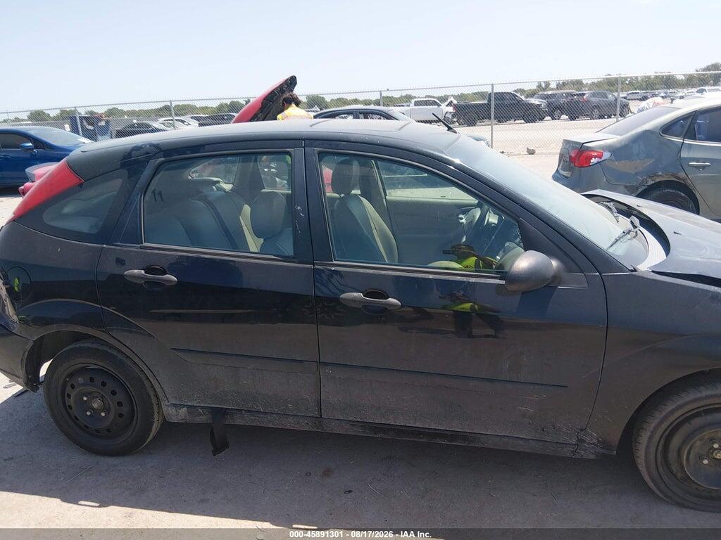 3FAFP37Z74R117937 2004 FORD FOCUS photo no. 12