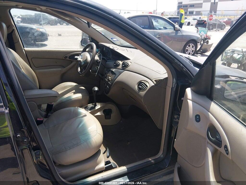 3FAFP37Z74R117937 2004 FORD FOCUS photo no. 5