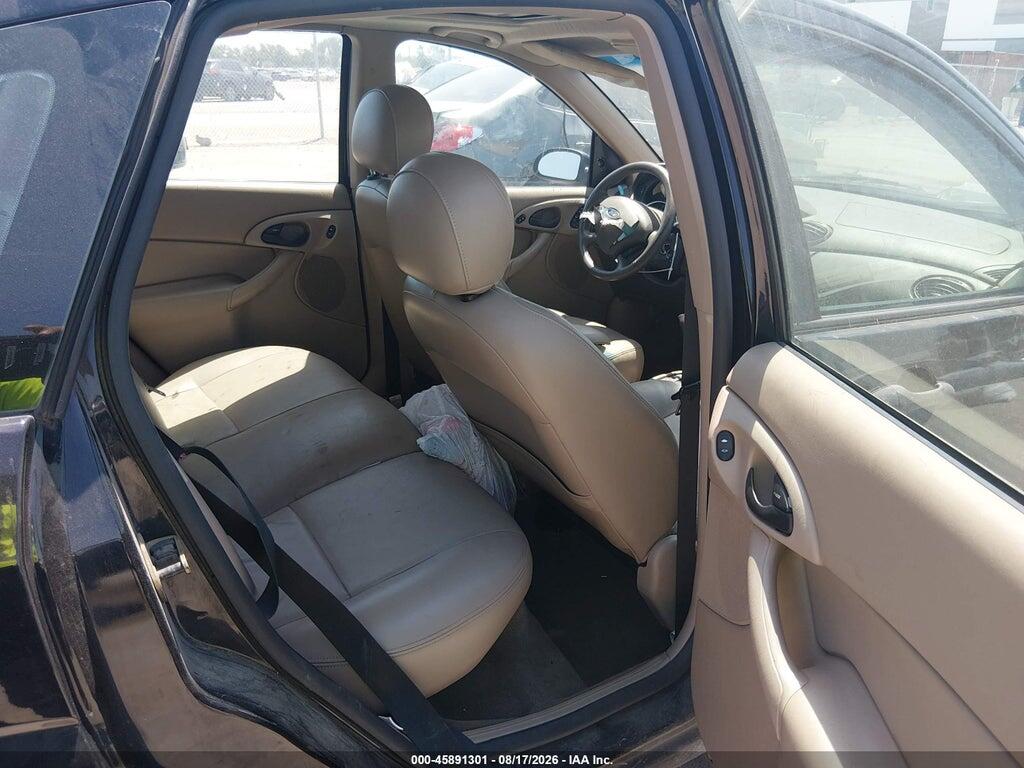 3FAFP37Z74R117937 2004 FORD FOCUS photo no. 8