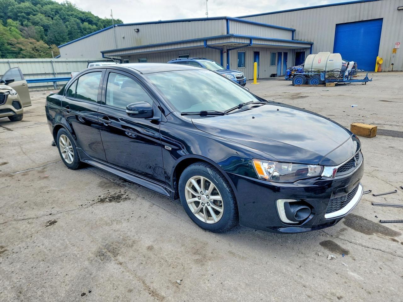 JA32V2FW0GU009722 2016 MITSUBISHI LANCER photo no. 4