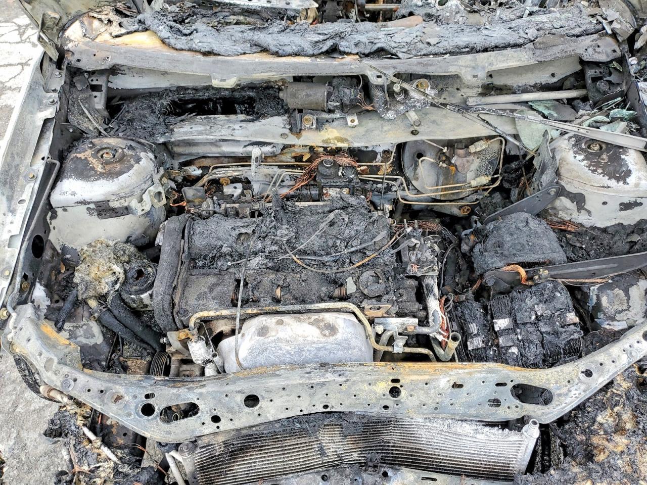 1FAFP3430YW255323 2000 FORD FOCUS photo no. 11