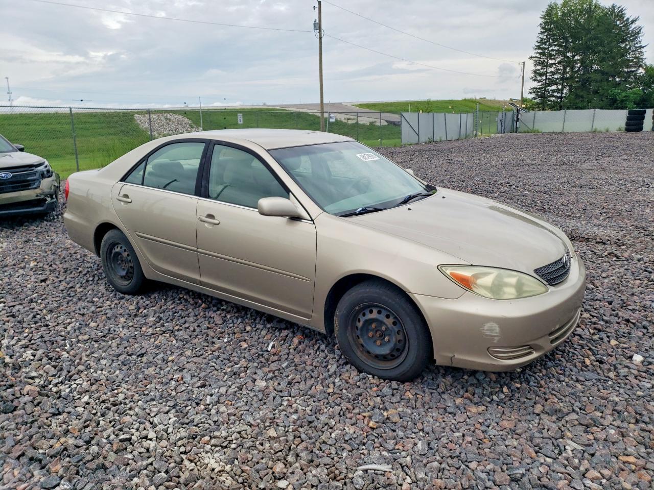2004 TOYOTA CAMRY LE — Фото 4 из 12