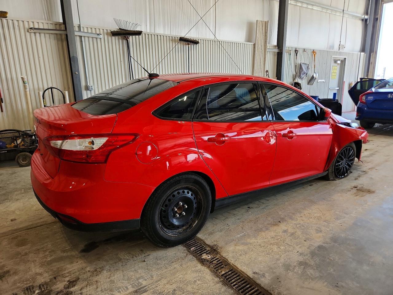 1FAHP3F26CL174835 2012 FORD FOCUS photo no. 3