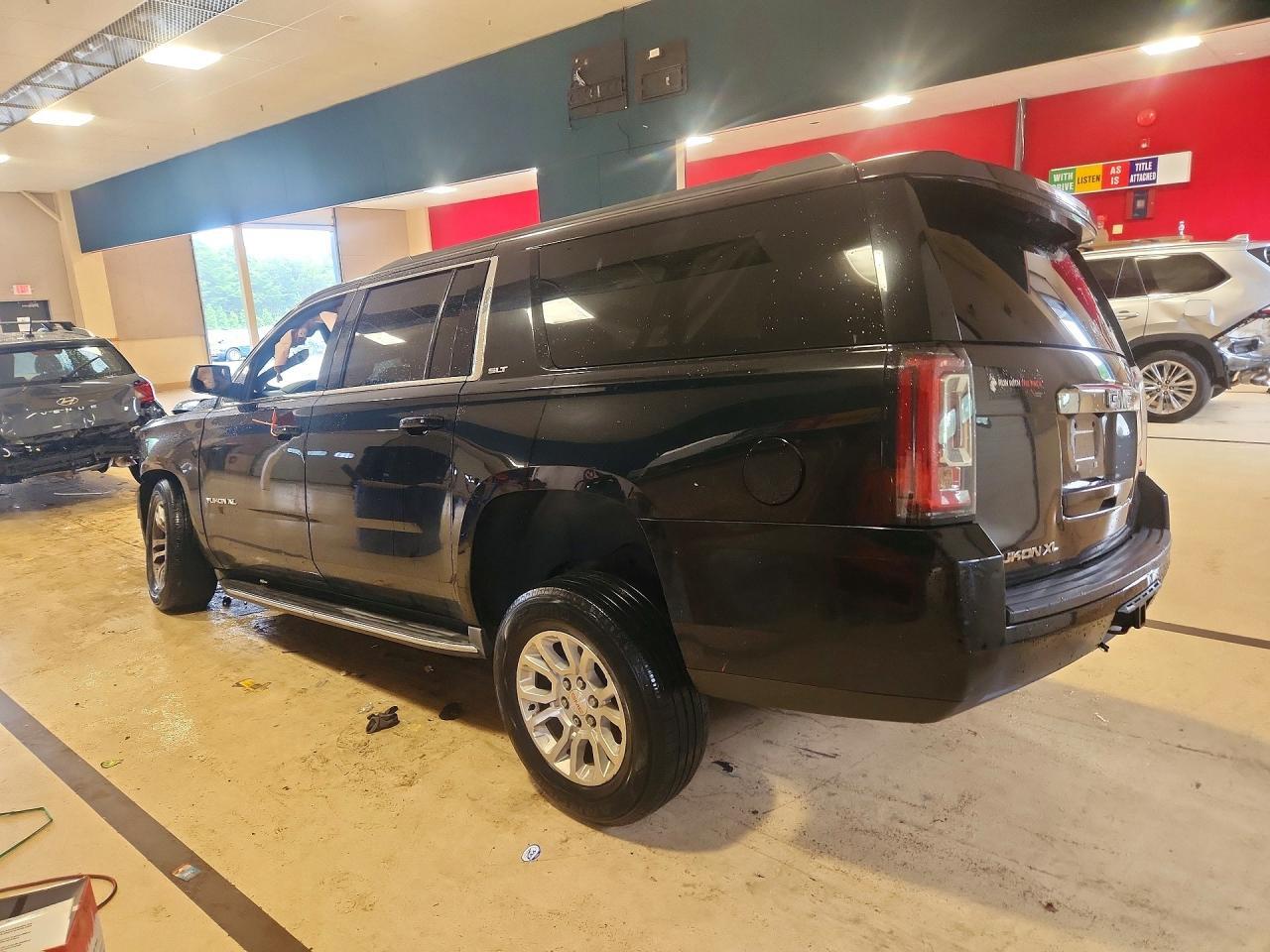 2016 GMC YUKON XL K1500 SLT — Фото 2 из 13
