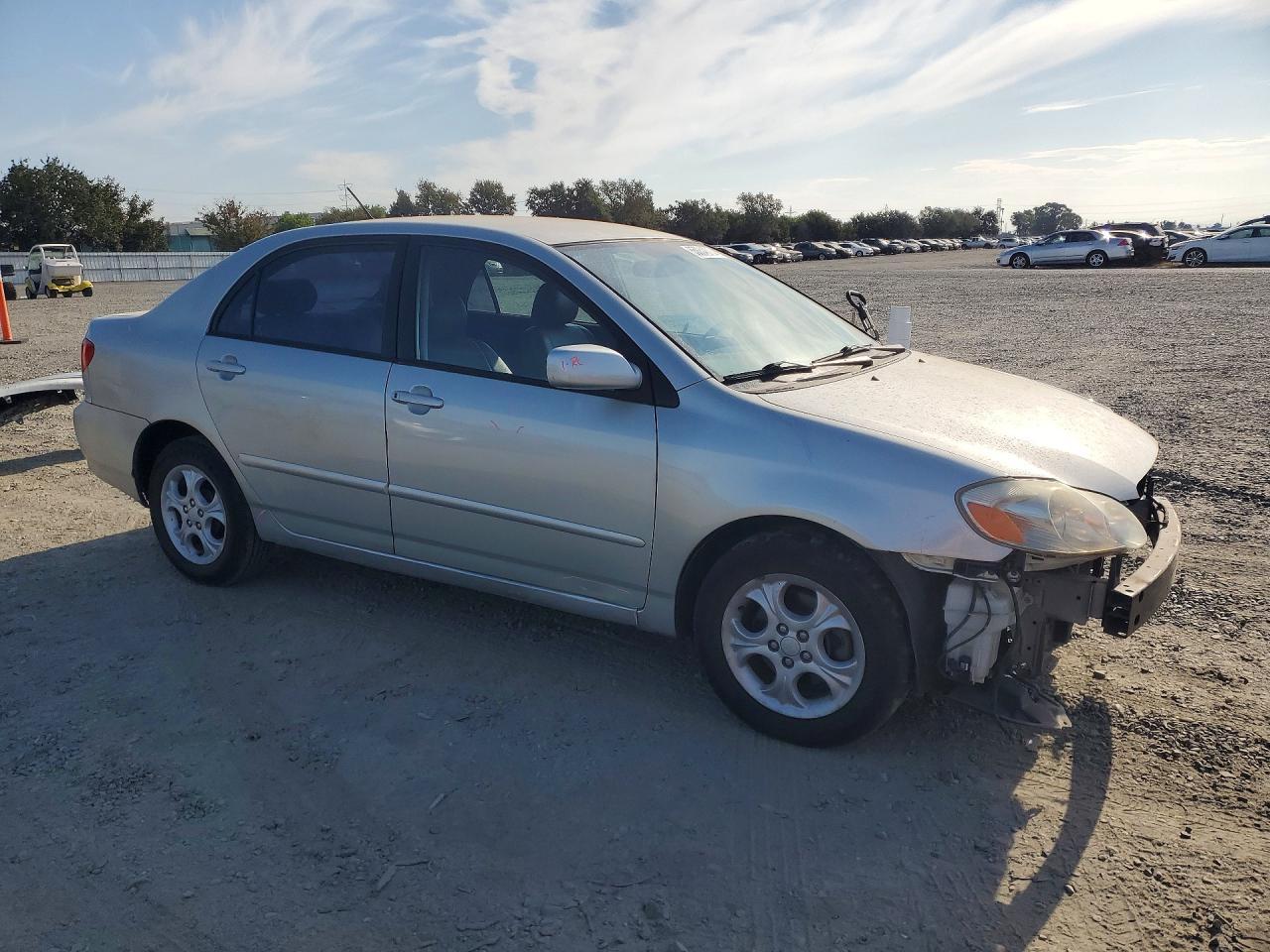 2003 TOYOTA COROLLA LE — Фото 4 из 13
