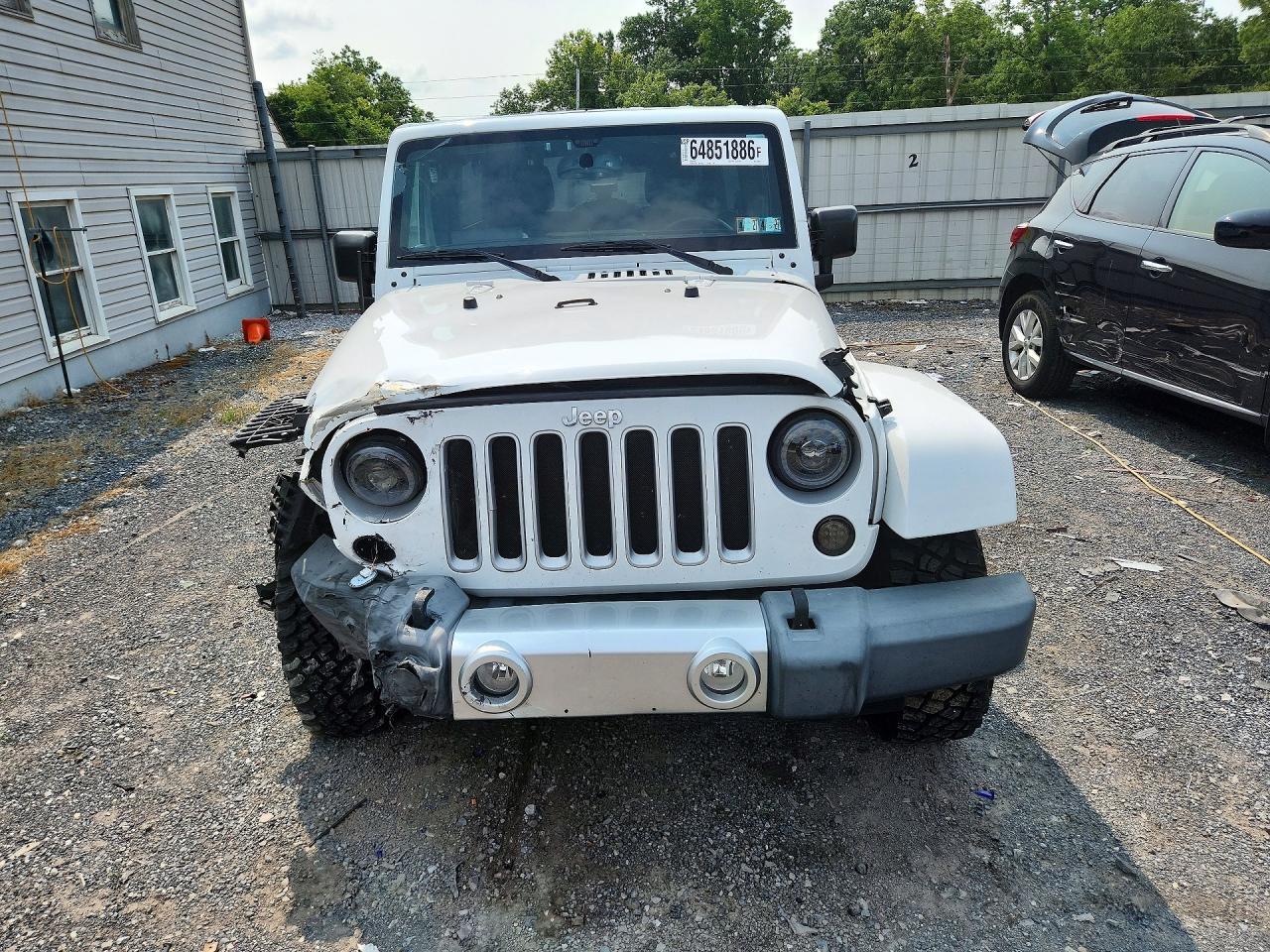 2016 JEEP WRANGLER UNLIMITED SAHARA — Фото 5 из 13