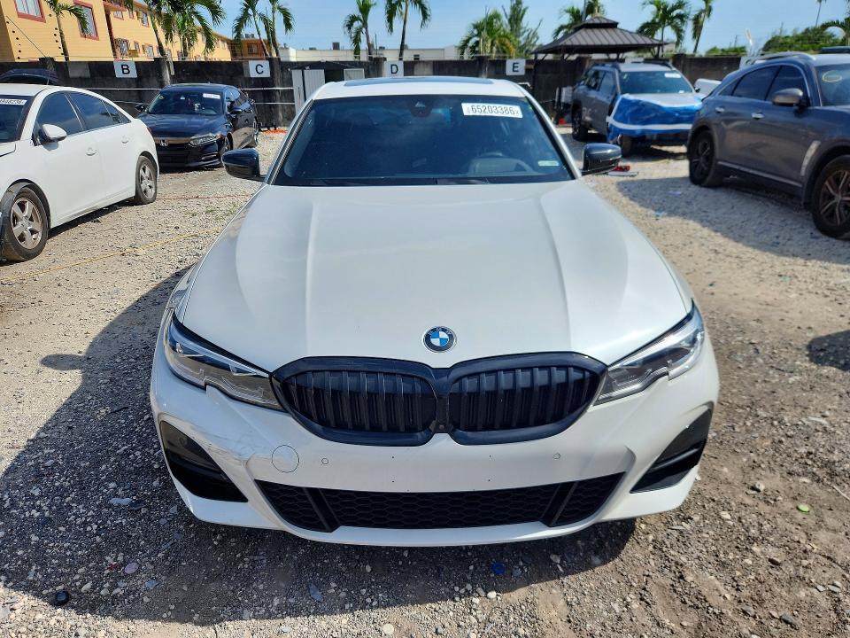 2021 BMW 330XI — Фото 5 из 13