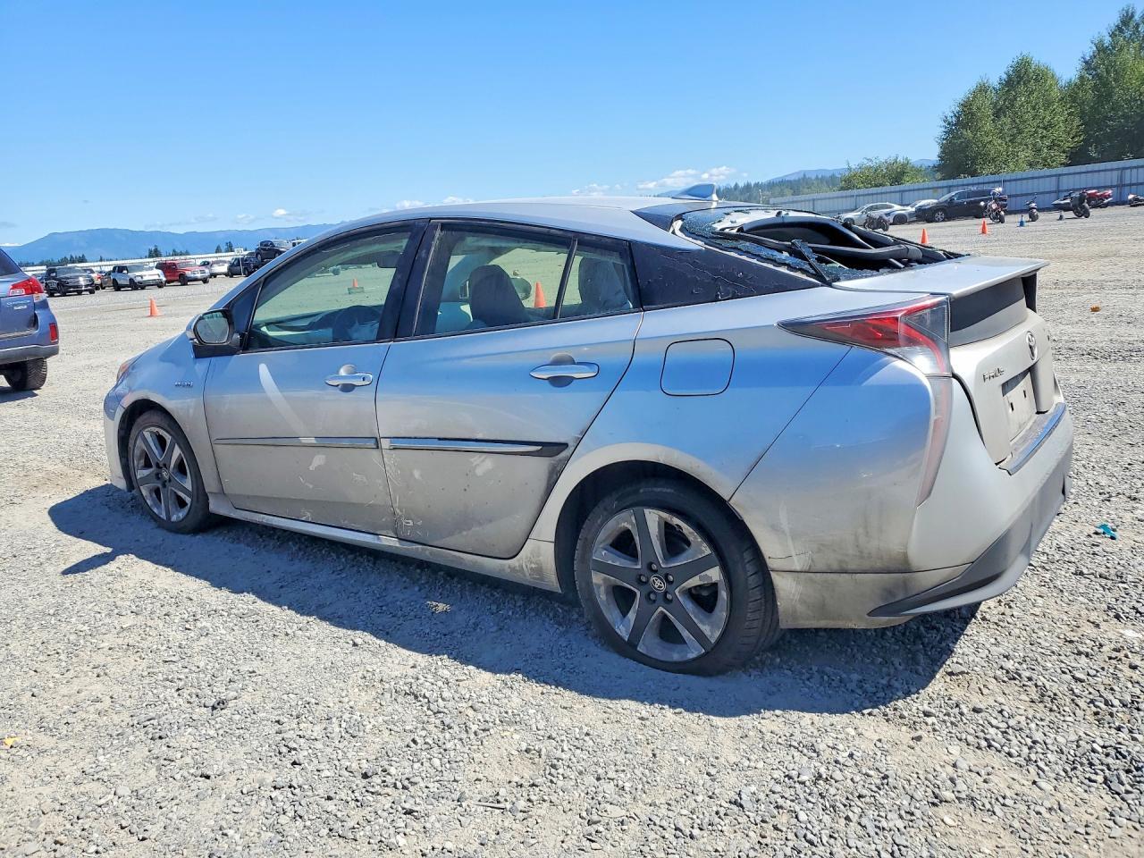 2016 TOYOTA PRIUS THREE TOURING — Фото 2 из 14