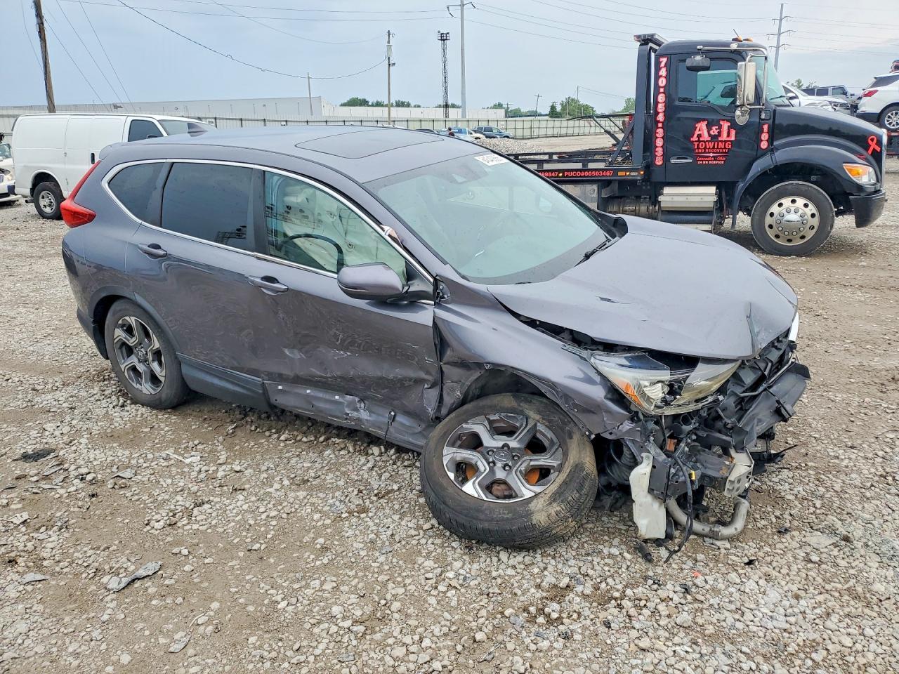 2HKRW2H50HH608228 2017 HONDA CR-V photo no. 4