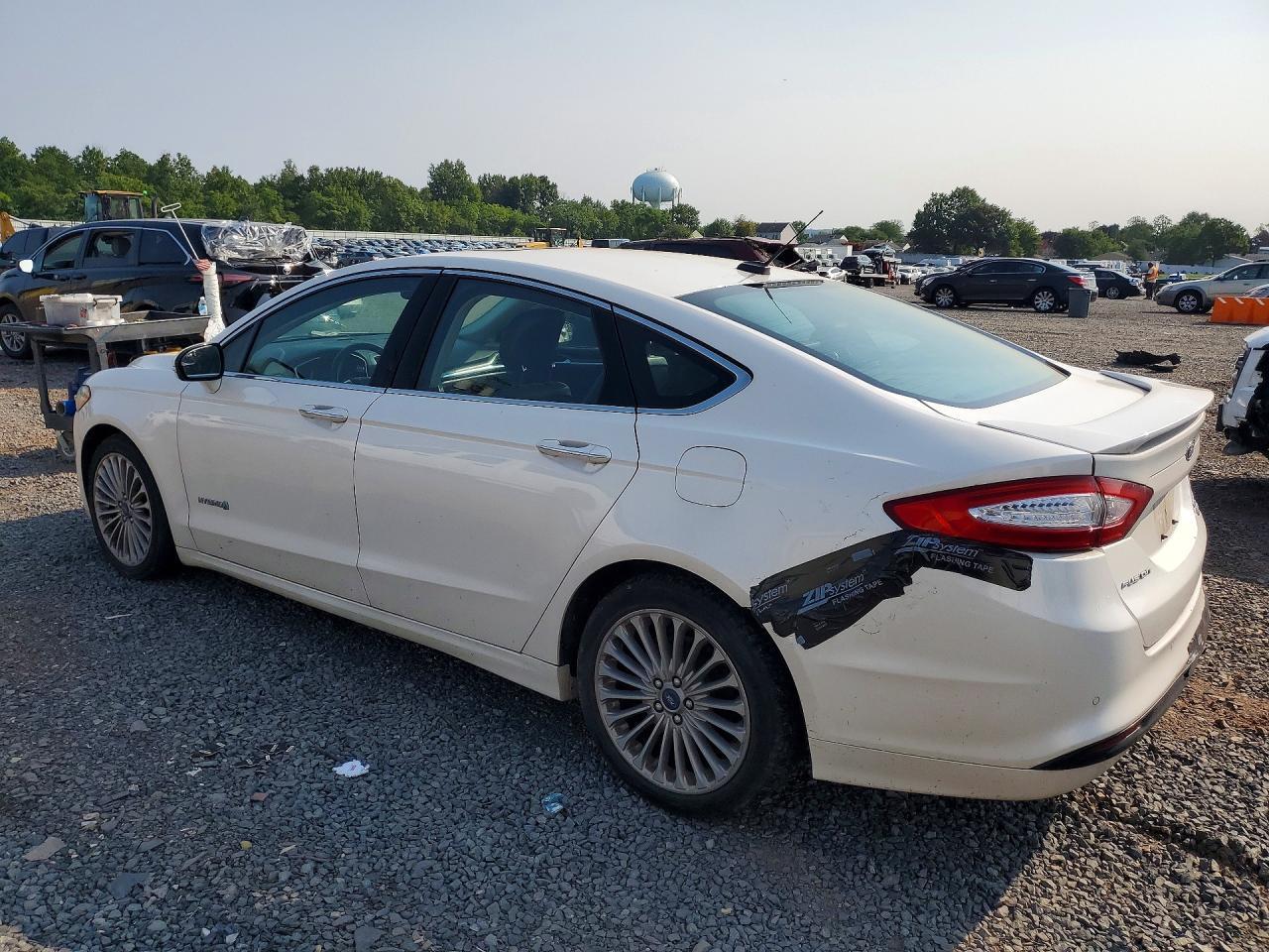 2014 FORD FUSION TITANIUM HEV — Фото 2 из 12