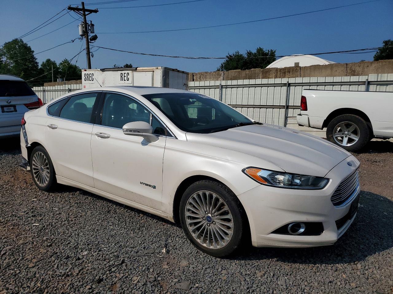2014 FORD FUSION TITANIUM HEV — Фото 4 из 12
