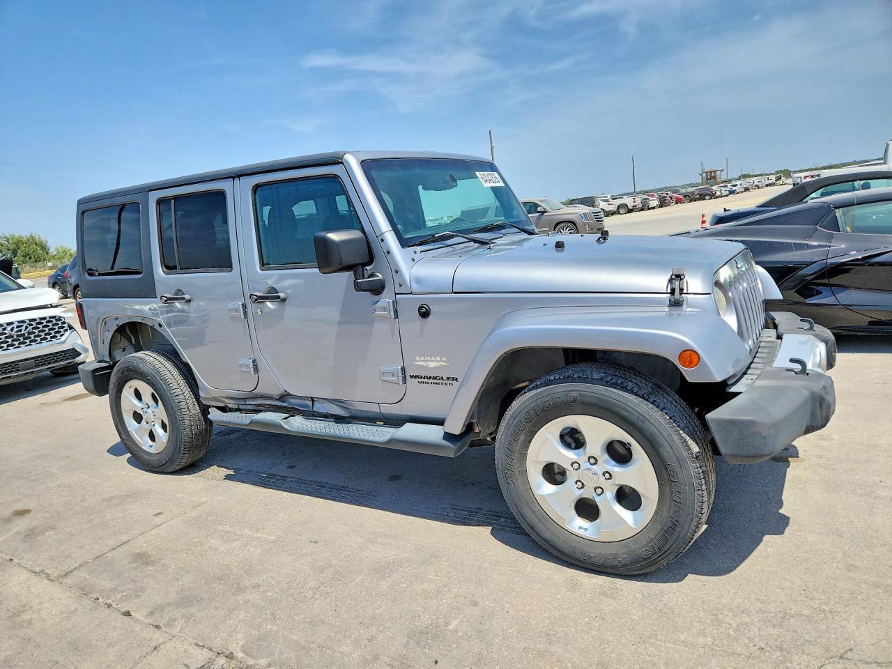2014 JEEP WRANGLER UNLIMITED SAHARA — Фото 4 из 13