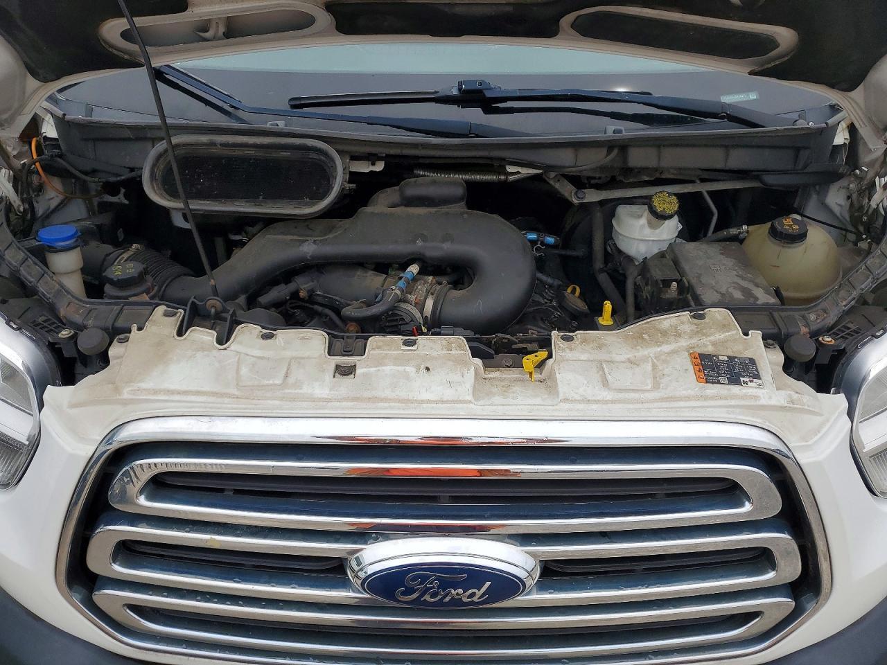 1FTYE2CM2JKA16477 2018 FORD TRANS 150 photo no. 12