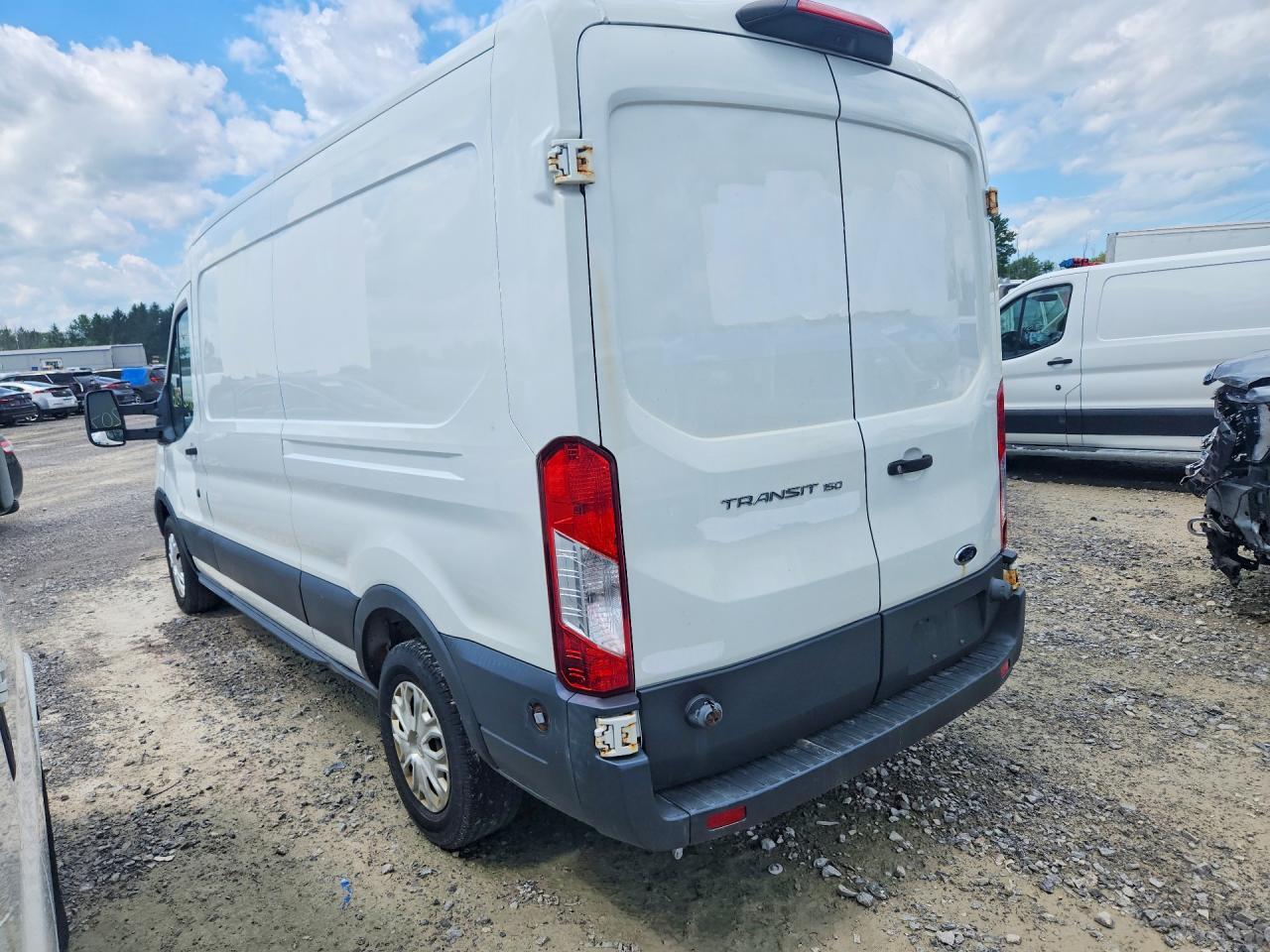 1FTYE2CM2JKA16477 2018 FORD TRANS 150 photo no. 2
