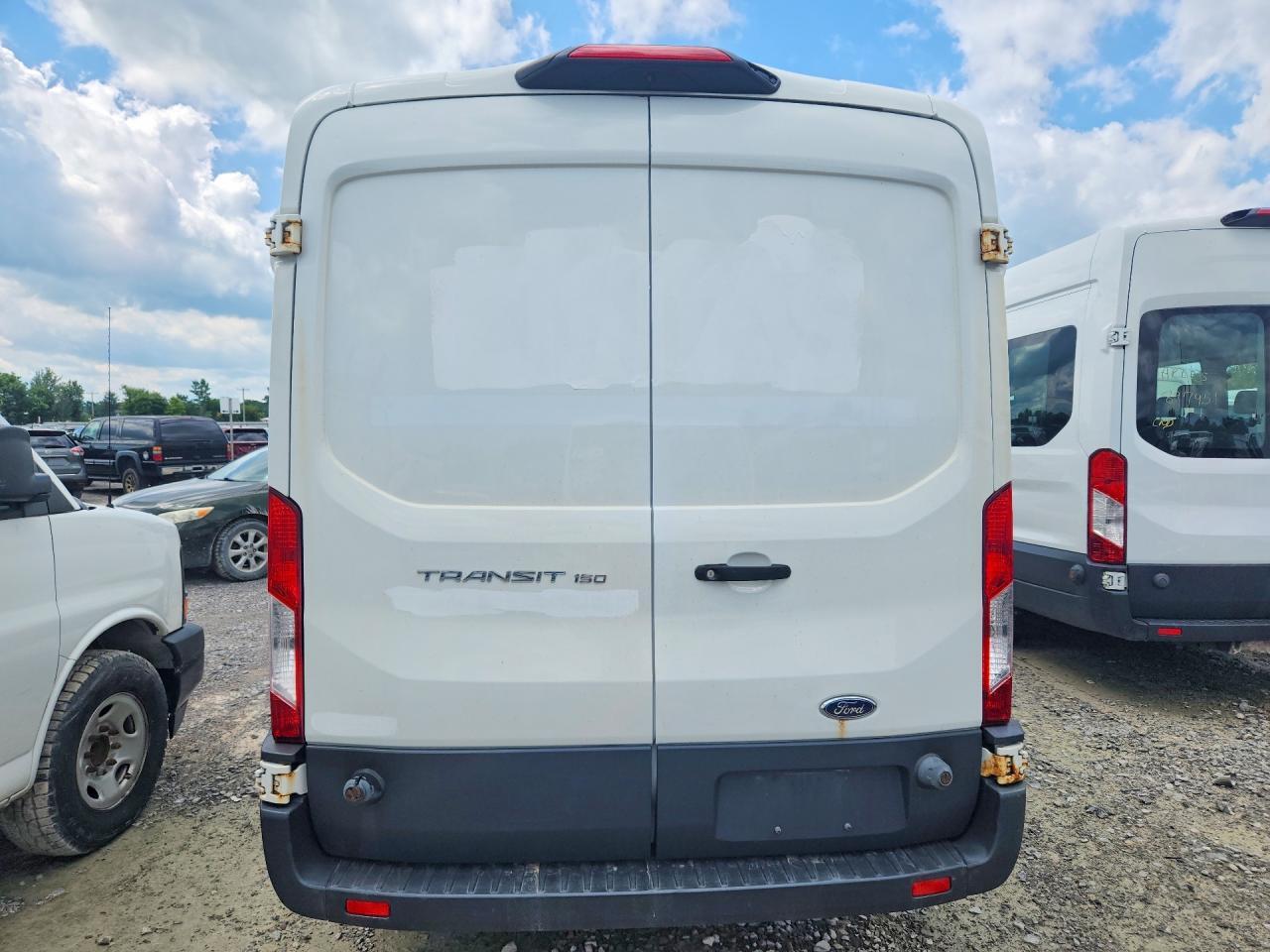 1FTYE2CM2JKA16477 2018 FORD TRANS 150 photo no. 6