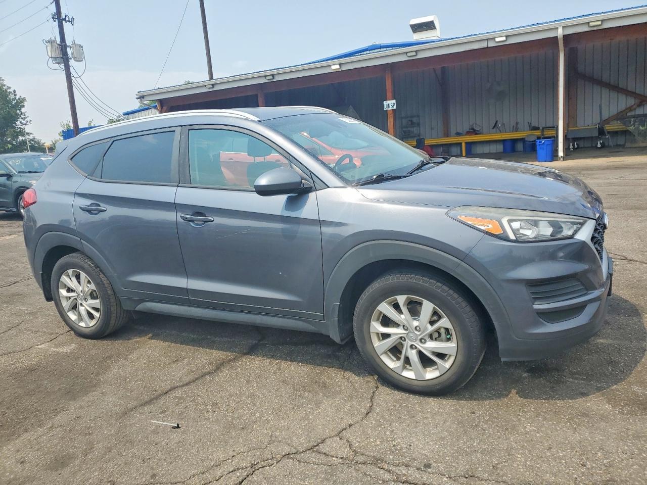 KM8J3CA45KU004602 2019 HYUNDAI TUCSON photo no. 4