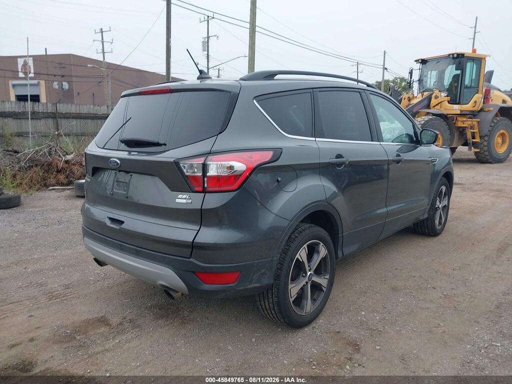 1FMCU9HD3JUA83040 2018 FORD ESCAPE photo no. 4