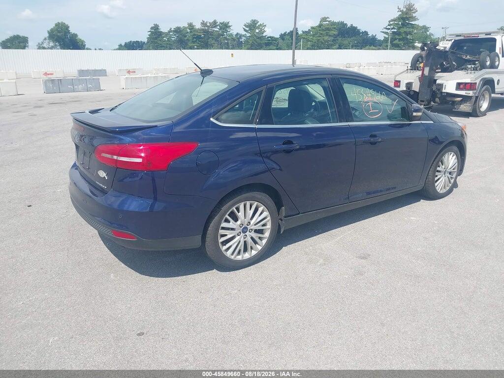 1FADP3J23HL219212 2017 FORD FOCUS photo no. 4