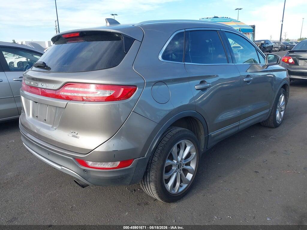 5LMCJ2C90GUJ21946 2016 LINCOLN MKC photo no. 4