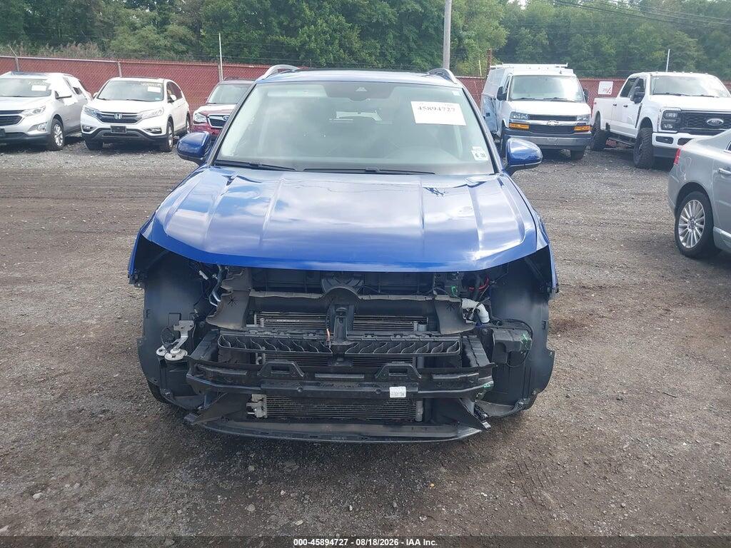 3VVVX7B22PM355446 2023 VOLKSWAGEN TAOS photo no. 12