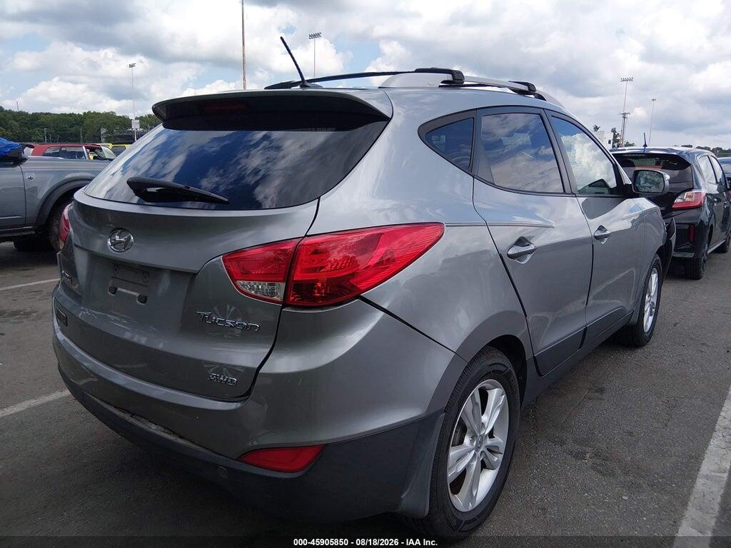 KM8JUCAC6DU677972 2013 HYUNDAI TUCSON photo no. 4