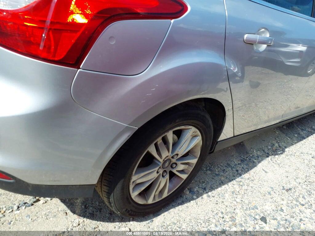 1FAHP3M29CL367371 2012 FORD FOCUS photo no. 12