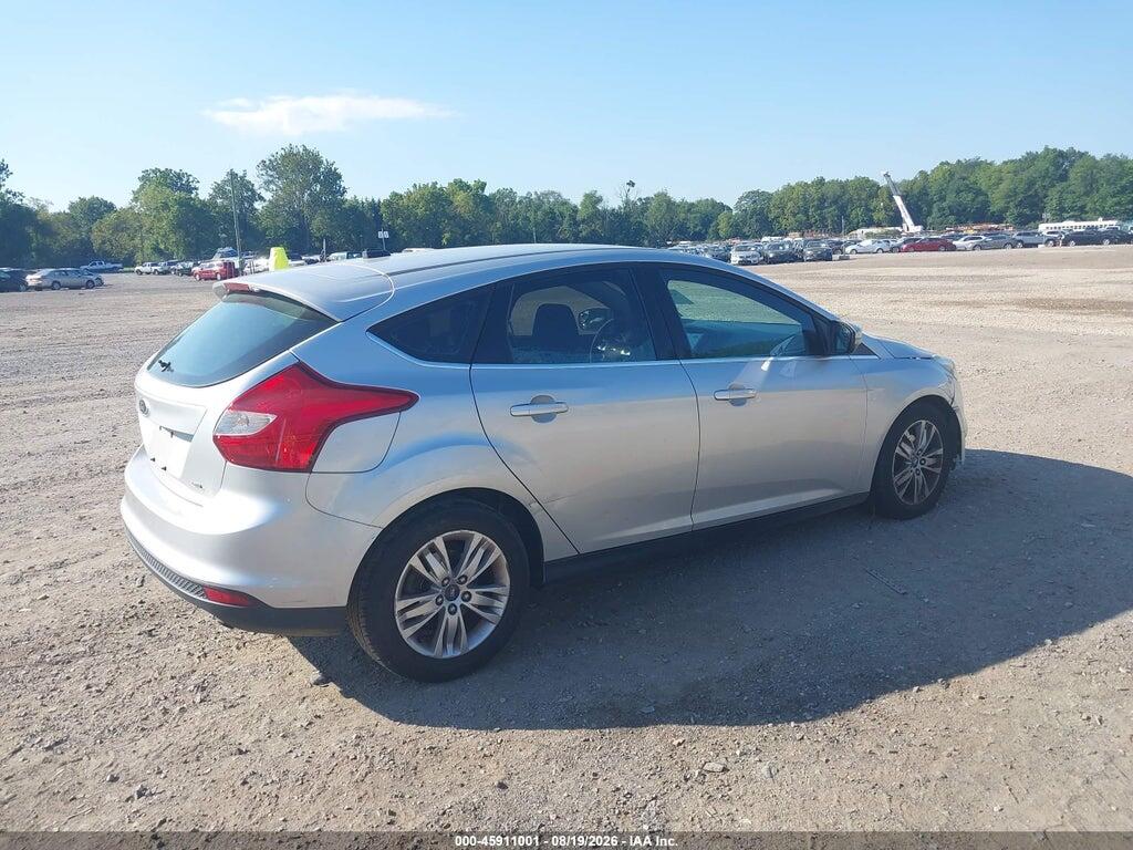 1FAHP3M29CL367371 2012 FORD FOCUS photo no. 4