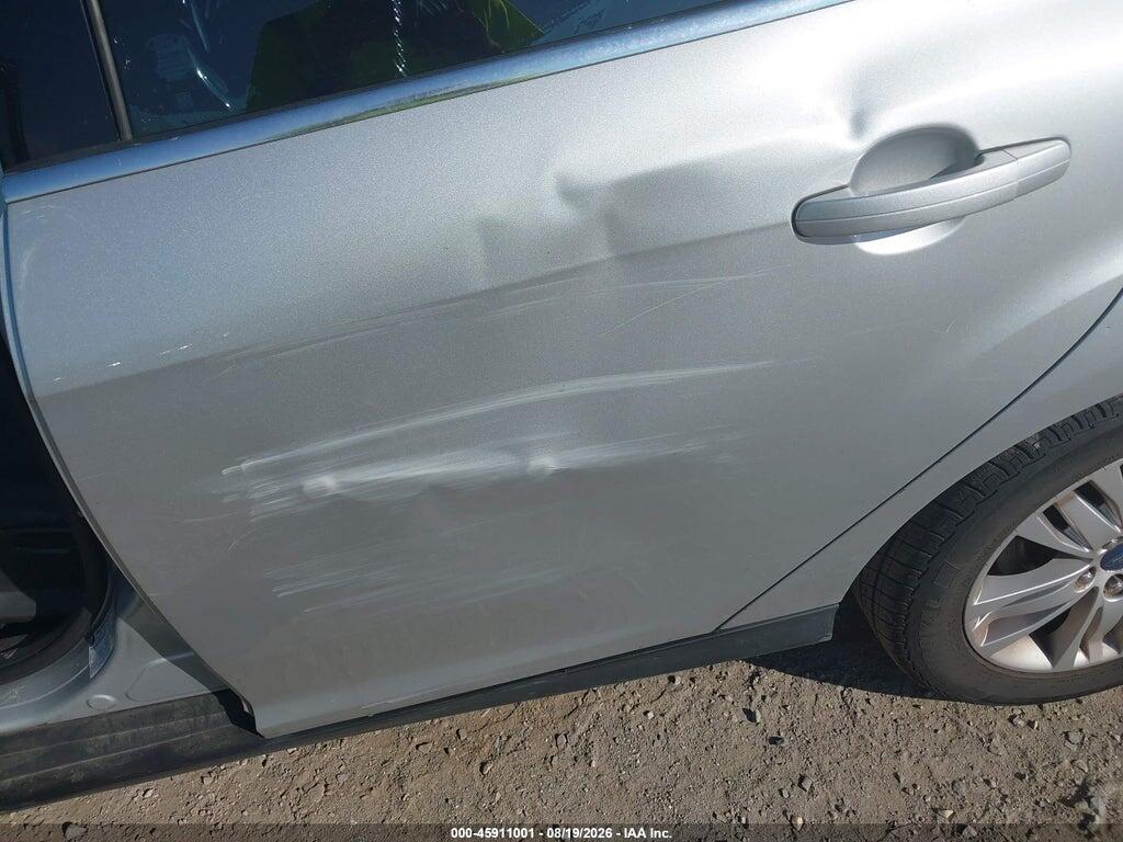 1FAHP3M29CL367371 2012 FORD FOCUS photo no. 6