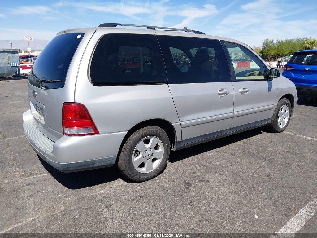 2FMZA57694BB04398 2004 FORD FREESTAR photo no. 4