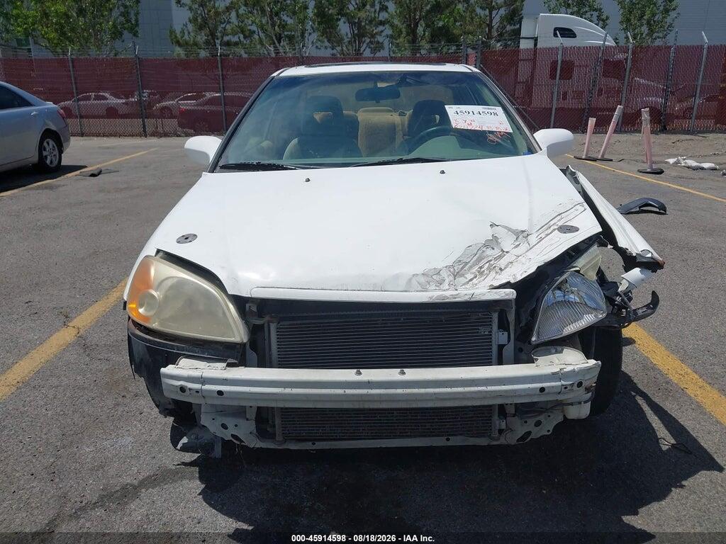 1HGEM22972L091031 2002 HONDA CIVIC photo no. 6