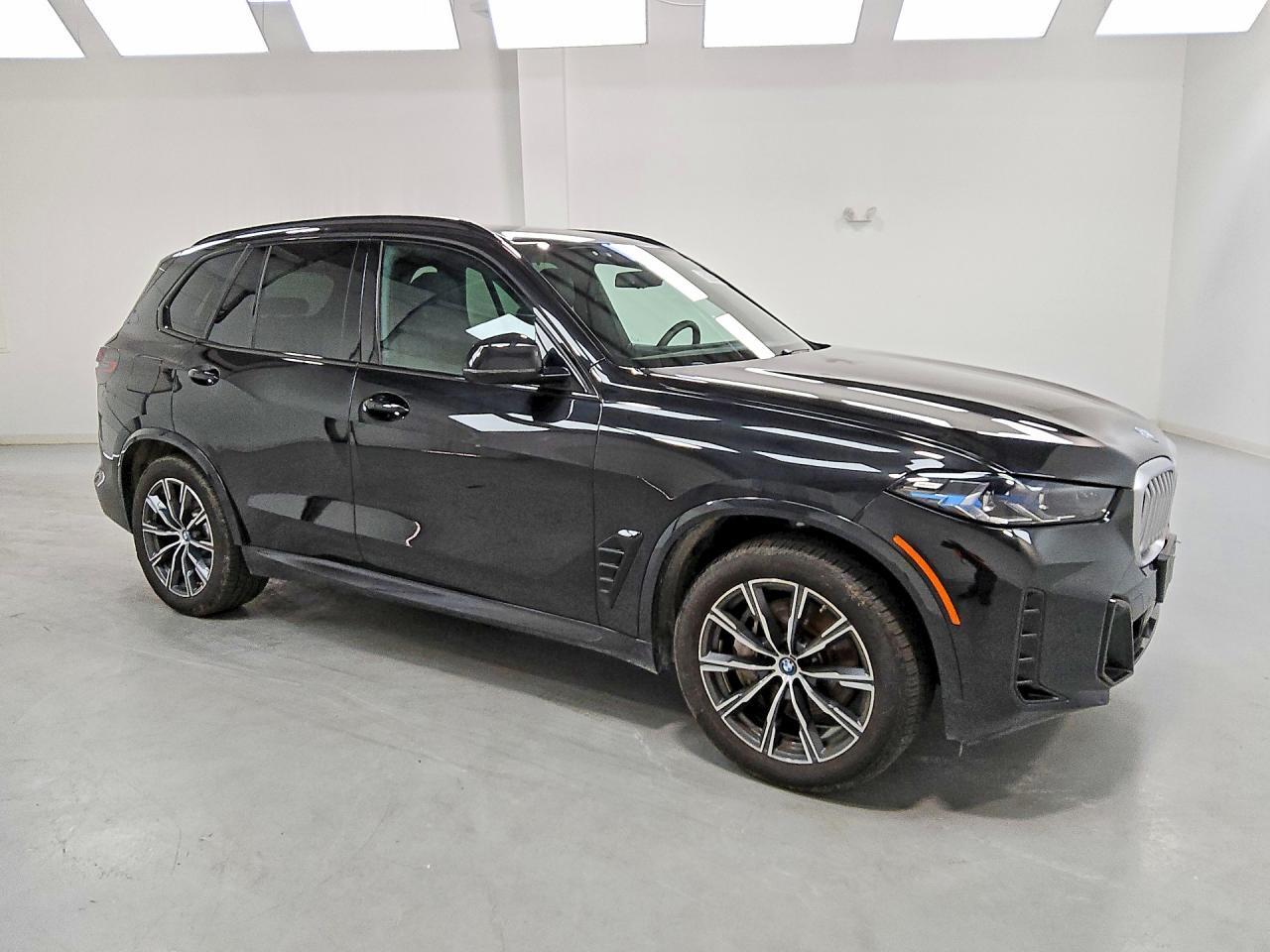 2025 BMW X5 XDRIVE50E — Фото 4 из 13
