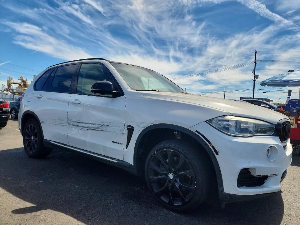 2015 BMW X5 XDRIVE35I — Фото 4 из 13