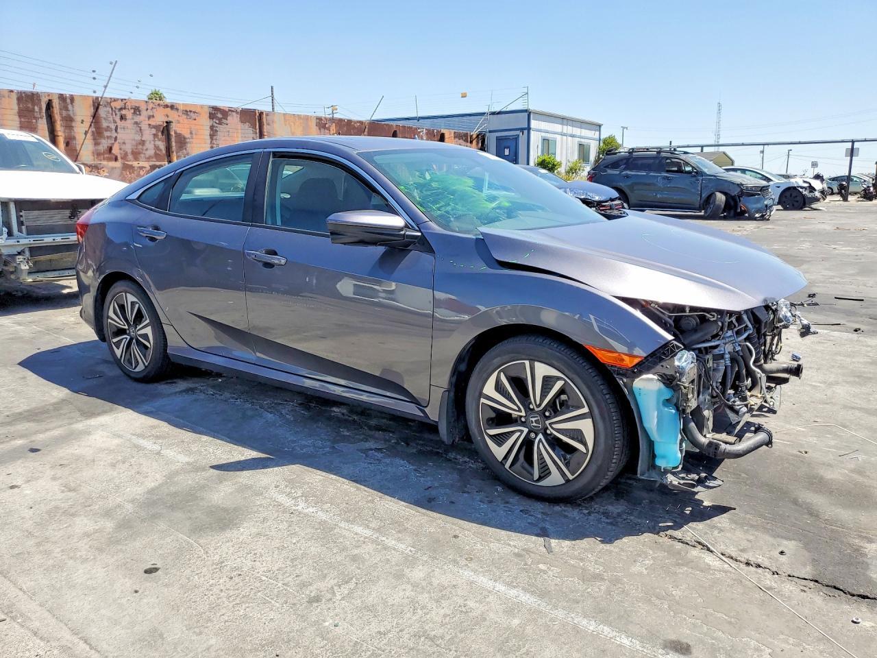 2HGFC1F34HH633781 2017 HONDA CIVIC photo no. 4