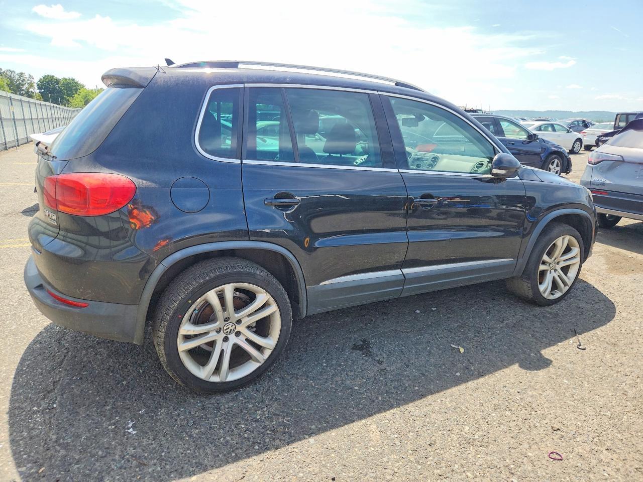 2013 VOLKSWAGEN TIGUAN S — Фото 3 из 13