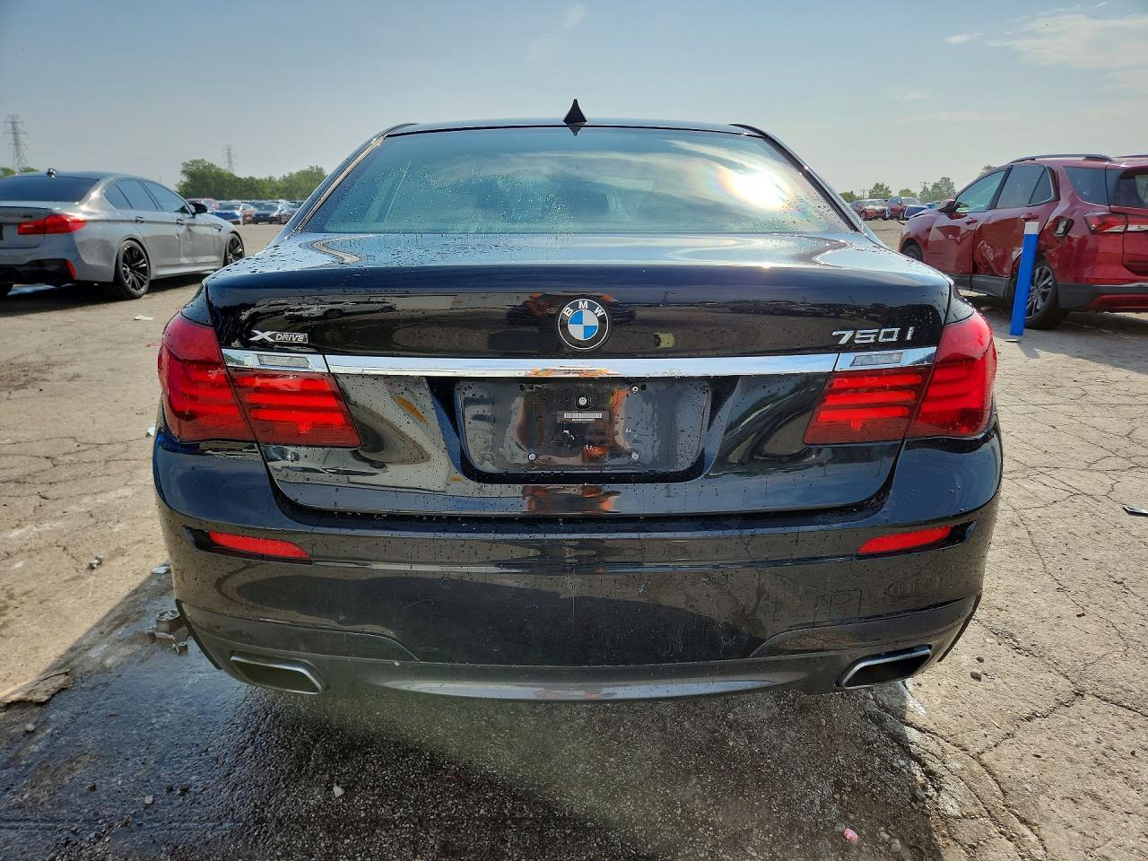 2015 BMW 750 XI — Фото 6 из 13