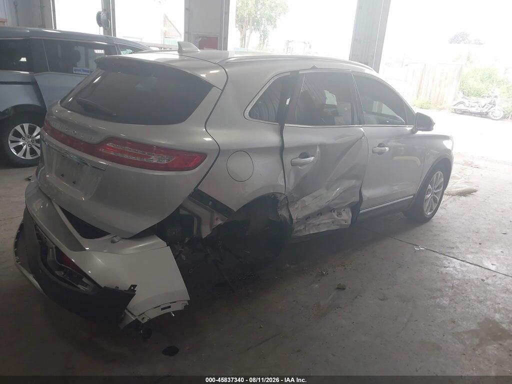 5LMCJ2D90KUL00639 2019 LINCOLN MKC photo no. 4