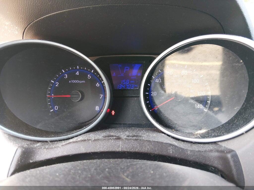 KM8JUCAC8CU545424 2012 HYUNDAI TUCSON photo no. 7