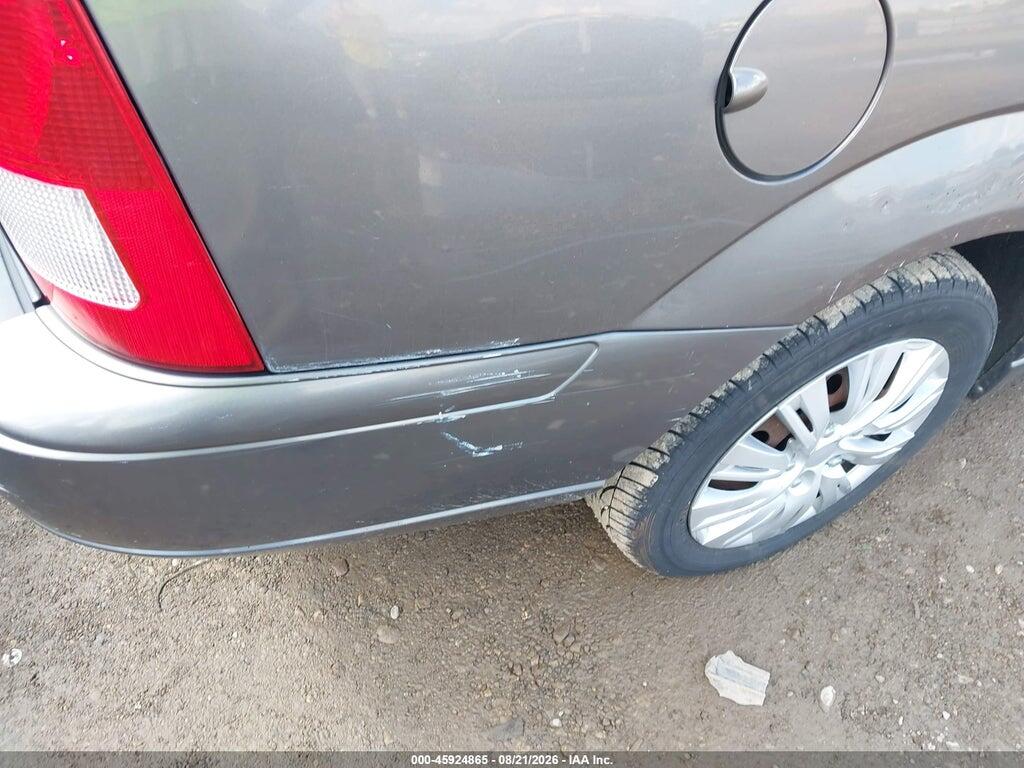 1FAFP36N06W167660 2006 FORD FOCUS photo no. 12