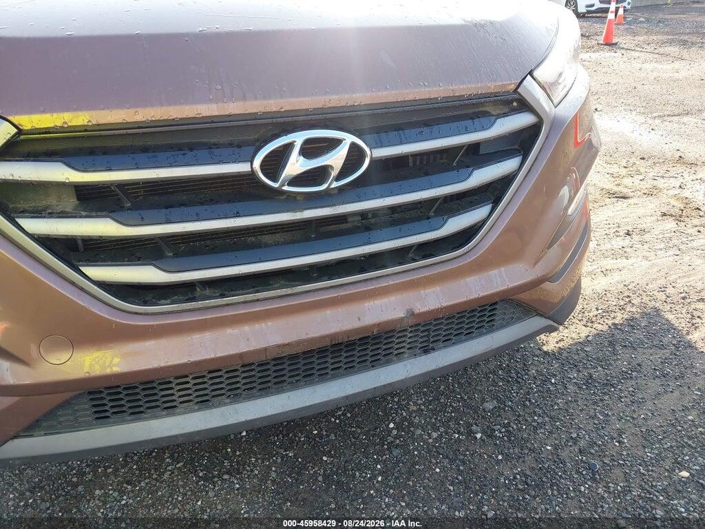 KM8J3CA28GU095564 2016 HYUNDAI TUCSON photo no. 6