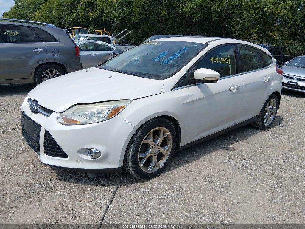 1FAHP3M29CL409053 2012 FORD FOCUS photo no. 2
