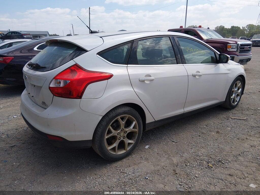 1FAHP3M29CL409053 2012 FORD FOCUS photo no. 4