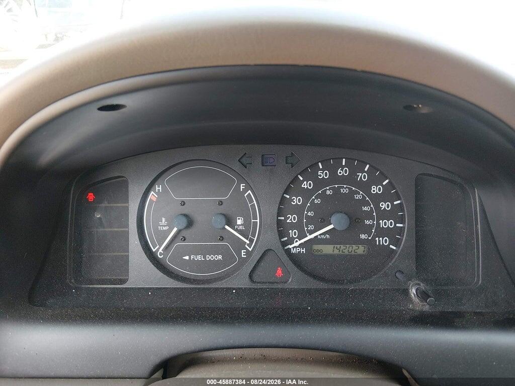 2T1BR12E7XC104014 1999 TOYOTA COROLLA photo no. 7